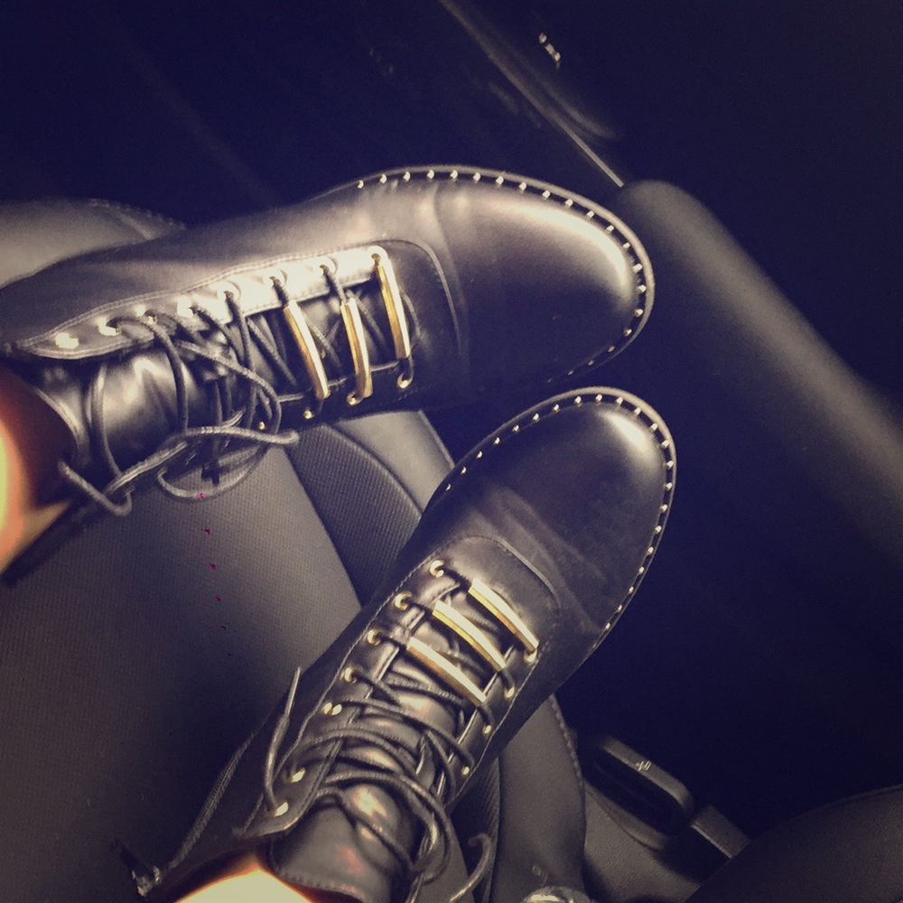 Gold studded lace up black boots